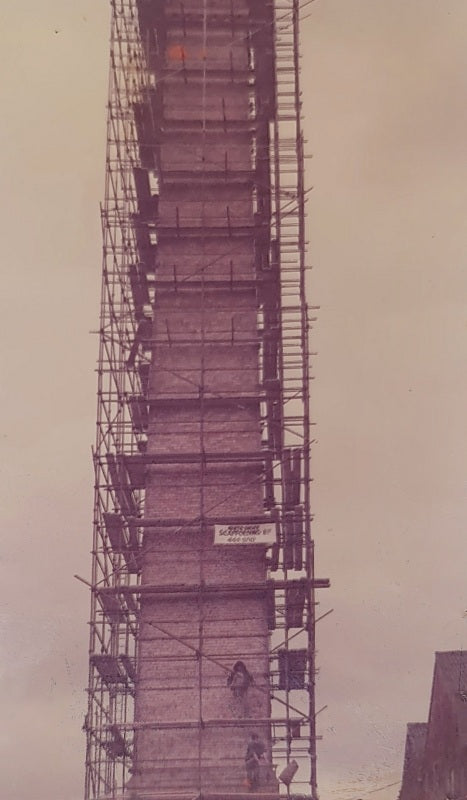 Scaffolding around the chimney